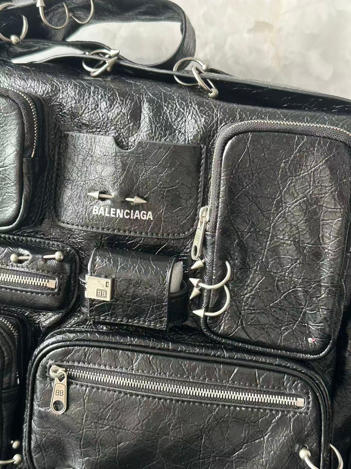 Balenciaga Superbusy tachonado